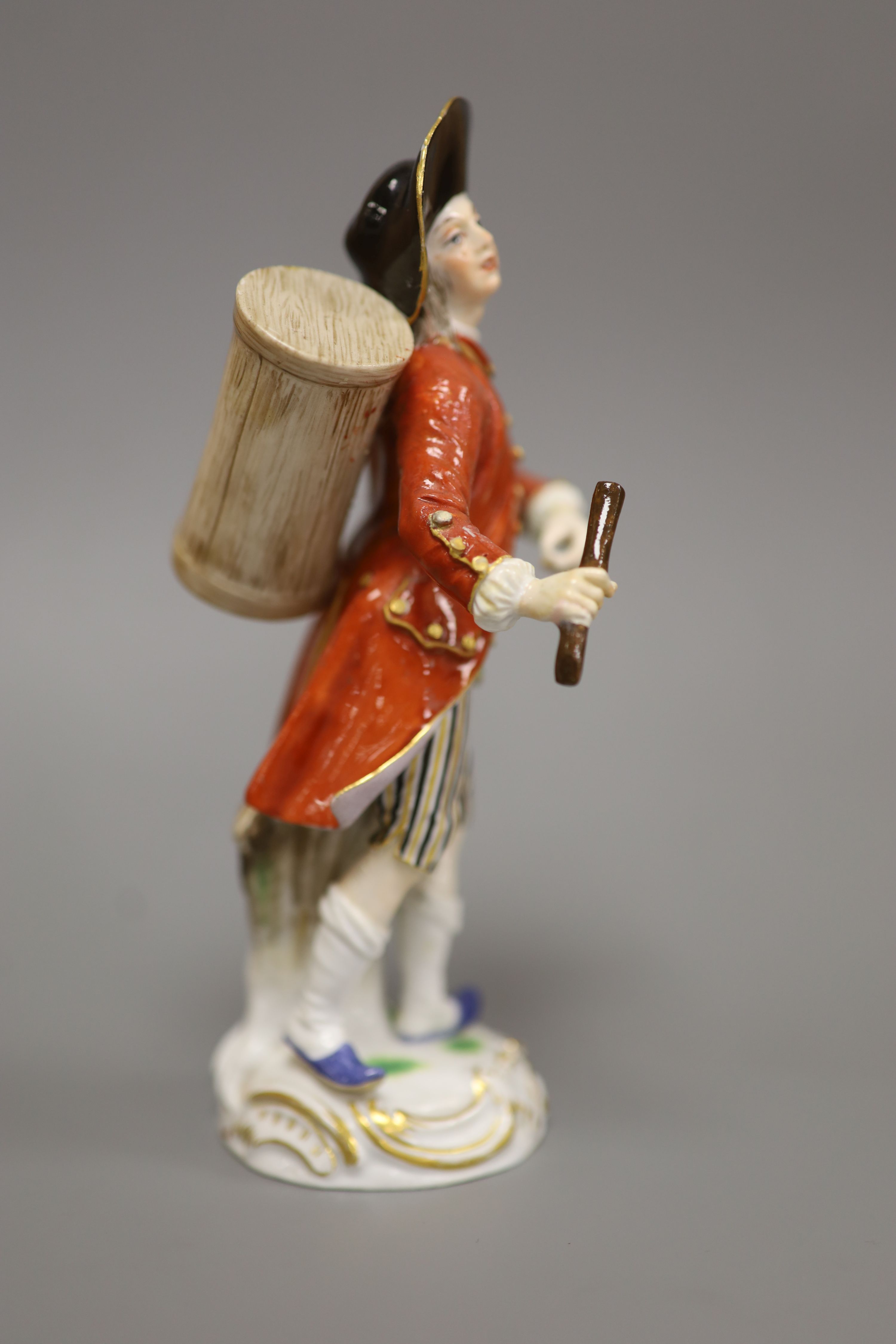 A late Meissen porcelain figure of a drummer boy, polychrome-decorated on scrolled base, height 15cm
